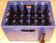 250 caisses de bière, plastique bleu foncé 24x33cl